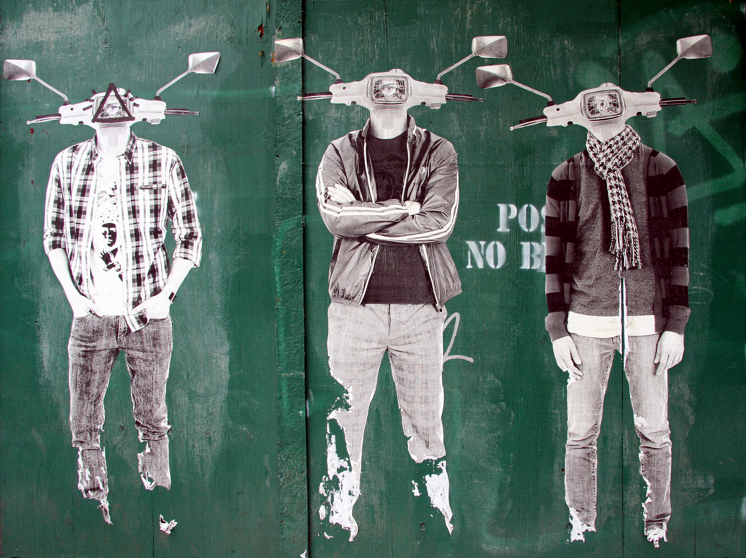 Weathered street-art photograph of three life-size paper cutout figures pasted on a green wooden wall, each wearing everyday clothing but with a motor-scooter front end/headlight in place of a head.